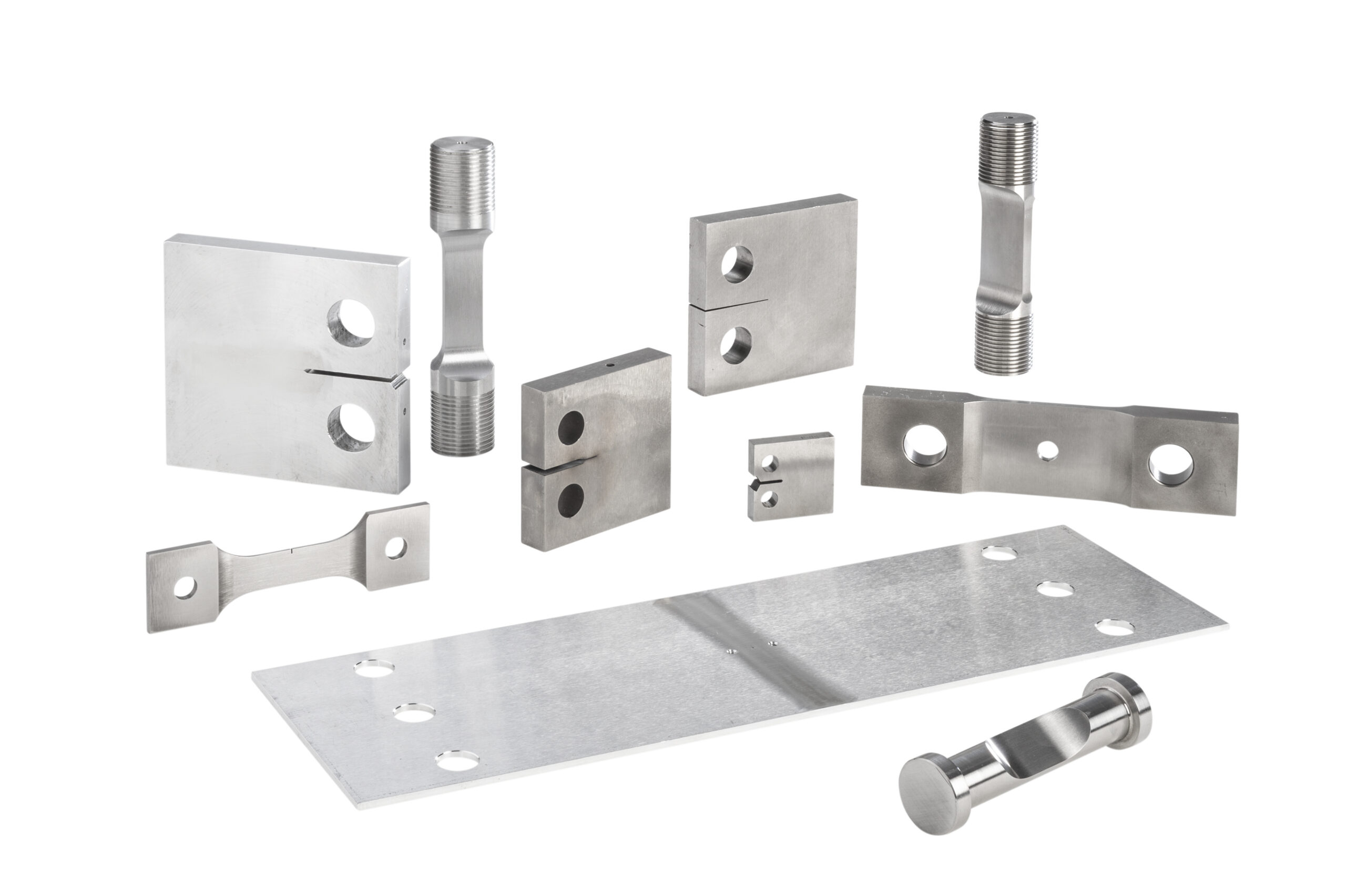 FTA machined metal test fixtures for fatigue crack growth and fracture toughness testing